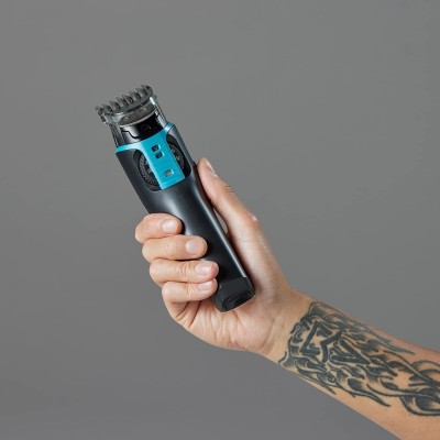 Машинка для стрижки Remington Power X Series X5, мережа+акум., роторний мотор, насадок-4, сталь, чорно-бірюзовий (HC5000)